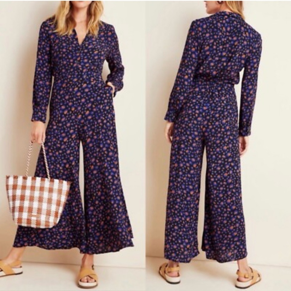 Anthropologie Loveland Wide Leg Jumpsuit in a blue animal print pattern.